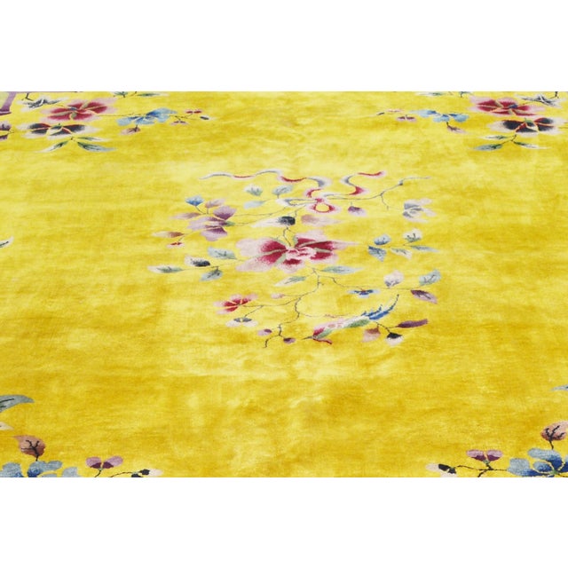 Hand-knotted with care using traditional rug-making techniques, this wool rug blends timeless craftsmanship with a modern...