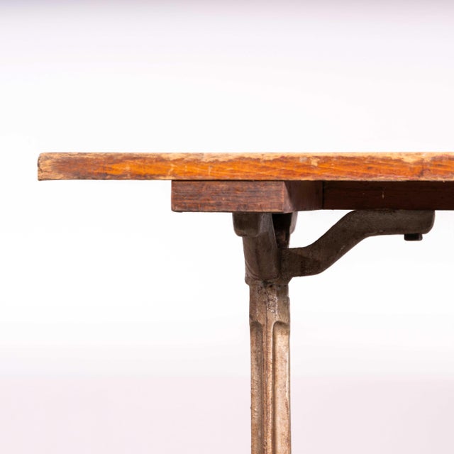 1930’s Original Cast Base Fischel Bistro Dining Table. Fischel was founded in 1871 by Czech born David Gabriel Fischel, a...