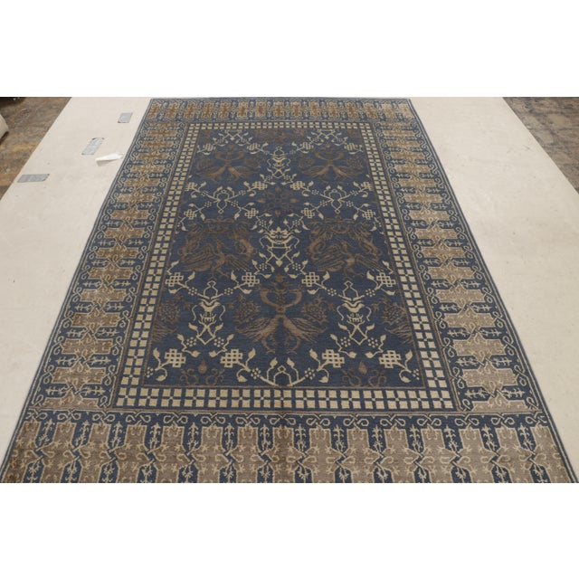 Made with hand-knotted wool and silk, this 6x9 contemporary rug joins the European Collection by Rug & Kilim—drawing...