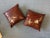 A pair of decorative brown faux crocodile pillows hand embellished with abalone shell and jeweled crabs by ANKASA. Taffeta...