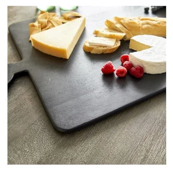 The Nox Serving Board In a durable mango wood and stained in a deep black, this serving board is made for the modern day...