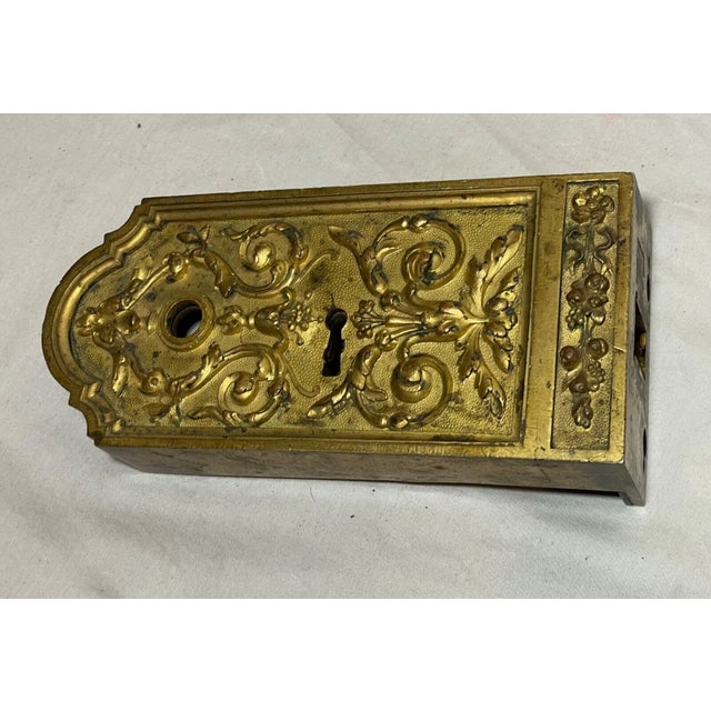 Crafted in Paris, this rare antique door lock hardware is a testament to the opulence of Victorian-era craftsmanship. The...