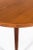 This is a rare teak dining table model NV-56 designed by Finn Juhl. It was produced by cabinetmaker Niels Vodder in Denmark.