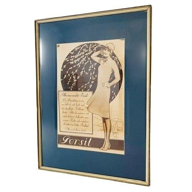 Beautifully framed original Art Deco Persil advertisement featuring the White Lady, framed with a blue mat from the 1920s....