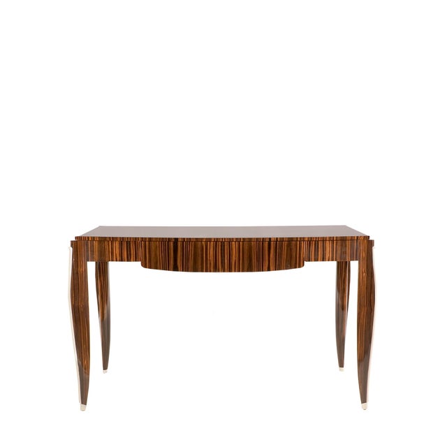 A very smart integration of rich materials and voluptuous lines make for an exquisite bureau of Macassar Ebony enhanced...