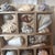 Elevate your coastal interior with this thoughtfully assembled, vintage-inspired cabinet of curiosities. This multi-...
