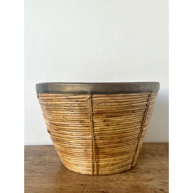 This monumental vintage pencil reed bowl is a spectacular example of 1970s Organic Modernism, blending rustic natural...