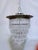 Italian layered chandelier with silver plated rim and 30% leaded U-drop crystal drops. It has 1 edison base socket that...