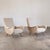 A sophisticated pair of 1950s Italian lounge chairs designed by Gigi Radice and produced by Minotti, evocative of the...