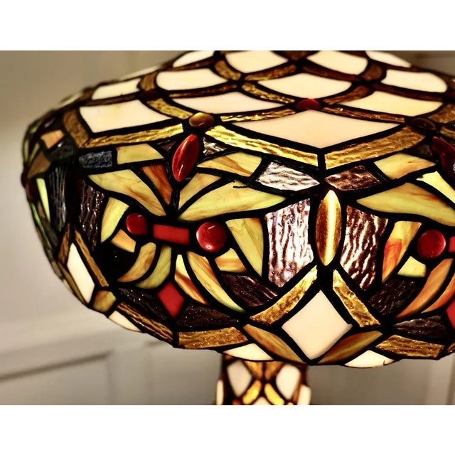 A Large Tiffany Style Stained Glass Table Lamp and Shade A very unusual and stunning piece, the lamp and the shade are...