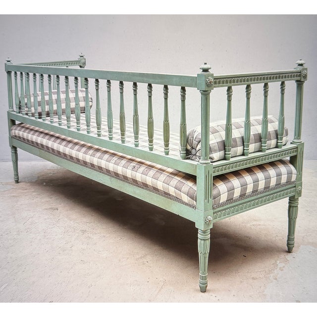 There are two matching chairs for the bench.