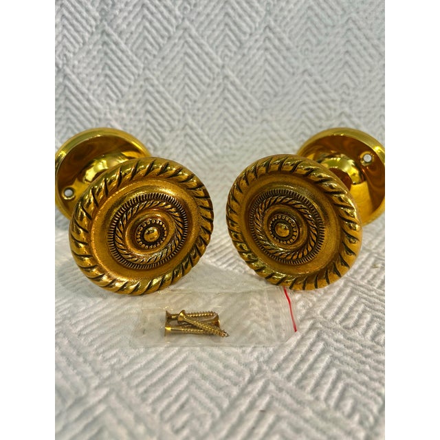 This is a pair of vintage Andrea by Sadek brass tie backs still in the original box. They are Georgian style and feature...
