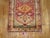One of a kind Turkish Anatolian runner with a triangular geometric motif throughout in bright colors on a blood red color...