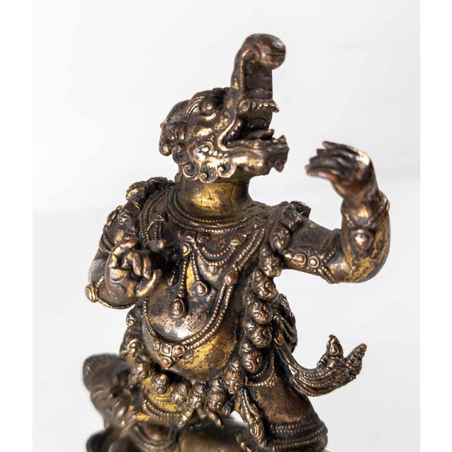 17th or 18th Century Chinese Sino-Tibetan Gilt Bronze Buddhist Makala Faced Deity Figure For Sale - Image 11 of 18