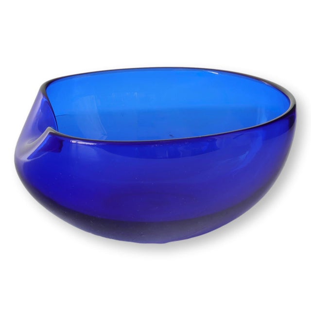 Iconic 1980s cobalt blue art glass bowl designed by Elsa Peretti for Tiffany & Co., crafted by master glassmaker Archimede...