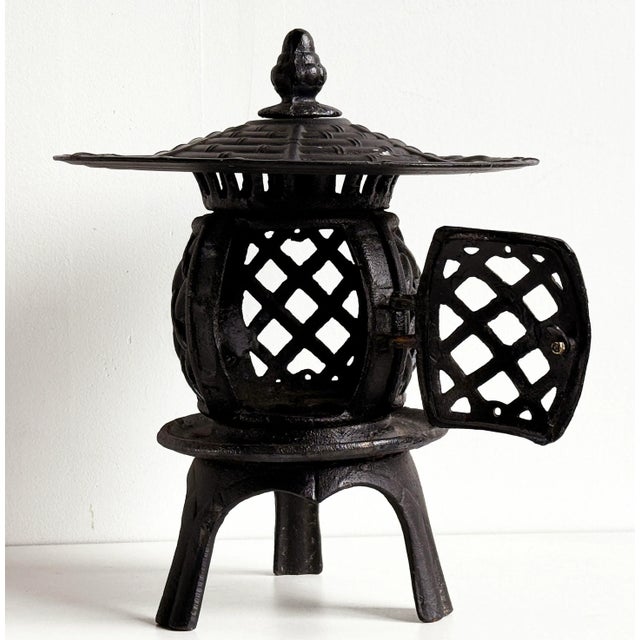 Beautiful vintage Japanese cast iron pagoda lantern. The lattice sides and classic pagoda roof create a cozy, welcoming...