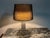 A striking Belgian Brutalist table lamp attributed to Willy Luyckx for Aluclair, dating from the 1960s–1970s. The lamp...