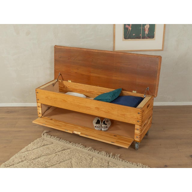 A unique vaulting box from the 1960s. High-quality solid wood body with a folding compartment, a hinged lid with storage...