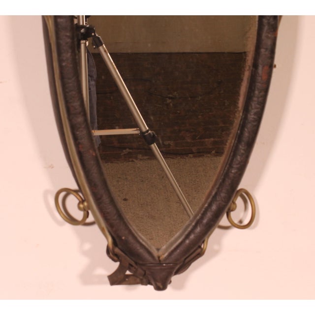 A charming mirror crafted from a leather horse harness. An original mirror that makes for a beautiful decorative piece In...