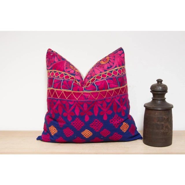 A lovely hand-embroidered pillow made from vibrant vintage tribal skirts coupled with a new linen back. This intricate...