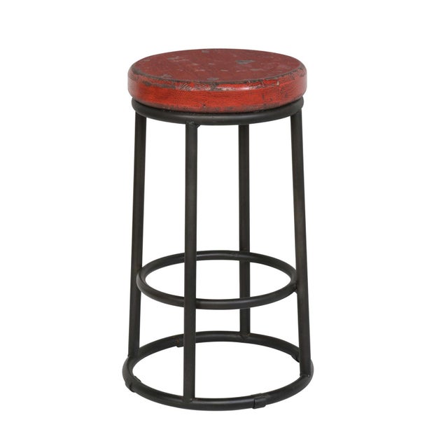 Round black iron base counter stool with distressed painted red salvaged wood top. Each slightly wonderfully unique in...