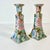 Beautiful hand painted Chinoiserie flora botanical Candleholders from the 1980s. They feature a large pink peony in the...