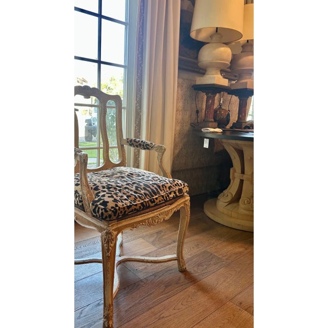 Antique French-Provincial, Louis XV Rococo-style Fauteuil armchair upholstered in a luxurious leopard velvet, carved with...