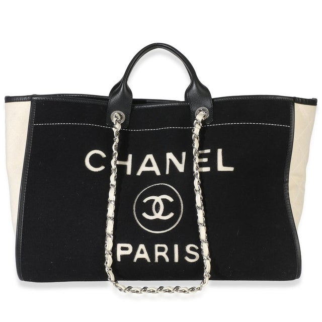 Item #: 154487 Interior Material: Fabric Size: Larger Features Interior: Two slip pockets. One zip pocket Dimensions: 17.5...