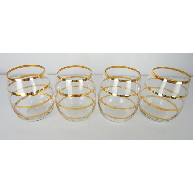 Fun set of 4 Mid-Century gold striped lowball glasses. Condition: Excellent vintage condition (see photos). One glass...