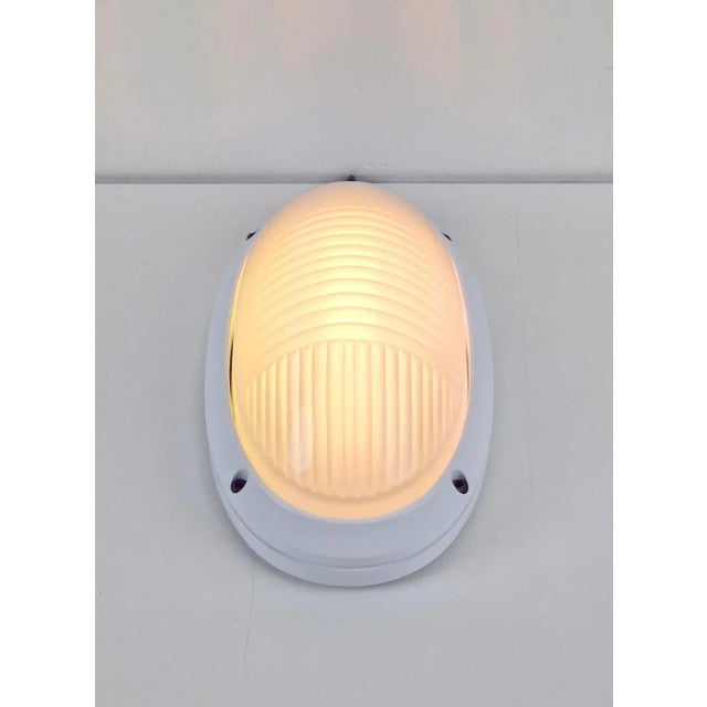 Vintage oval Outdoor wall lamp by Simes Vedo, metal & glass ’80 Italy white, set of 4 Vintage outdoor lamp from the...