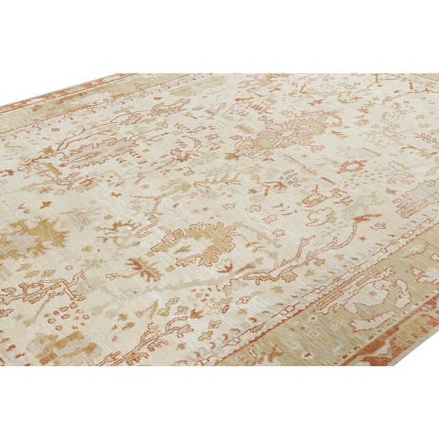 Hand-knotted in wool and silk, this 9x12 rug is a bold reimagining of Oushak rugs in one of Rug & Kilim’s most elegant new...