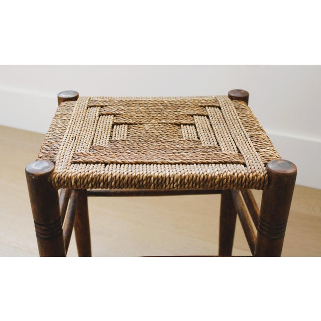 This charming stool is a one-of-a-kind find, original hand-woven rush seat. Authentic hand turned legs. The natural rush...