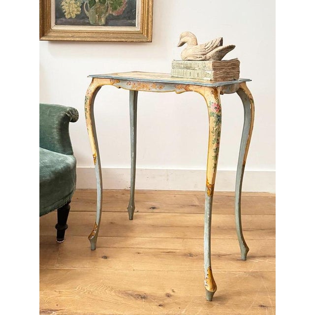 A wonderfully elegant early 20th century French hand painted side table. Such a lovely design with delightful paintwork....