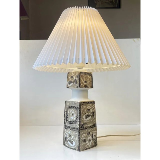 Ceramic Baca Table lamp designed by Nils Thorsson for Royal Copenhagen and Fog & Mørup circa 1970. It features a tactile...