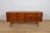 This sideboard was manufactured by the English manufacturer Greaves & Thomas in the 1960s. It showcases the british...