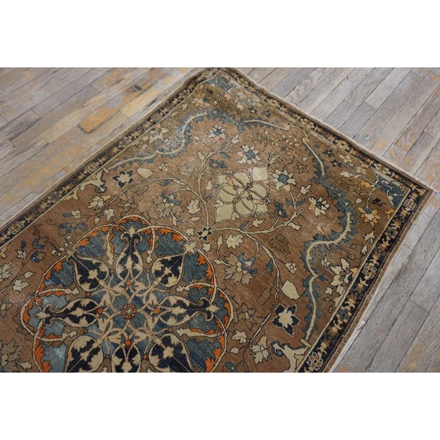 Lovely Traditional Camel Color Background and Dark Blue Border Floral Design Century Persian Tabriz Rug For Sale In New York - Image 6 of 11