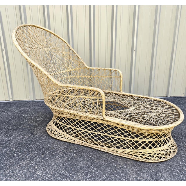 Exceptional vintage spun fiberglass chaise lounge attributed to Russell Woodard, featuring the highly sculptural webbed...