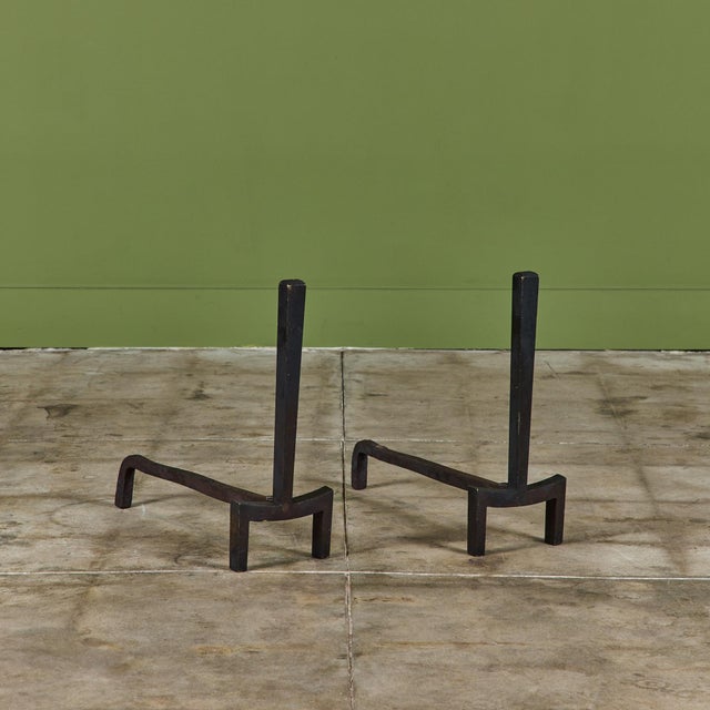 Pair of brass andirons for Saarinen Swanson Group by J. Robert Swanson, Pipsan Swanson Saarinen and Eliel Saarinen,...
