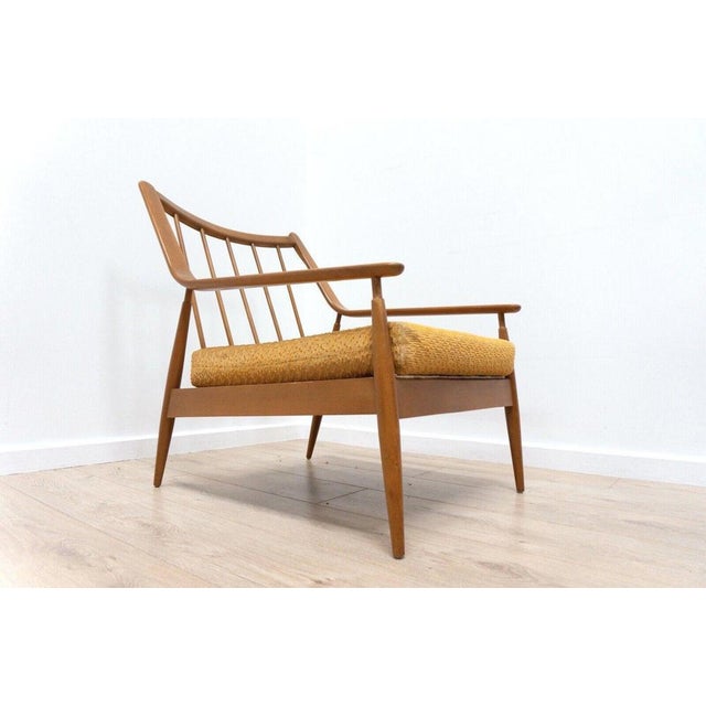 Mid-century vintage teak scandart lounge chair in excellent vintage condition. Original cushions in boucle fabric which...
