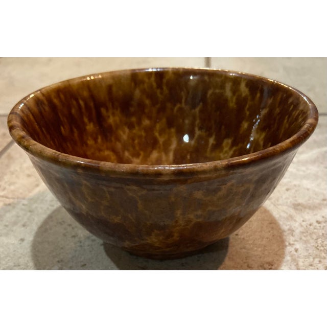 19th Century Spongeware brown and yellow ware Rockingham mixing bowl. This is the smaller bowl of our two listed. There...
