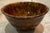 19th Century Spongeware brown and yellow ware Rockingham mixing bowl. This is the smaller bowl of our two listed. There...