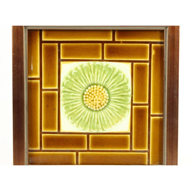 A great looking antique ceramic tile Majolica style glaze with floral motif in Art Nouveau / Arts & Craft style Very...
