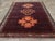 This mid-20th century Turkish Anatolian tribal carpet, measuring 7' 9" x 10' 0", presents a striking composition that...