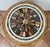 Antique Louis Philippe-style side table in gilded and carved wood with a marbled inlay top, dating from the first half of...