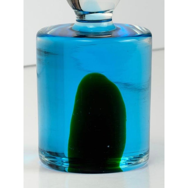 A 1970s Murano glass Sommerso paperweight designed by Antonio da Ros for Cenedese, featuring a sculptural cylindrical form...