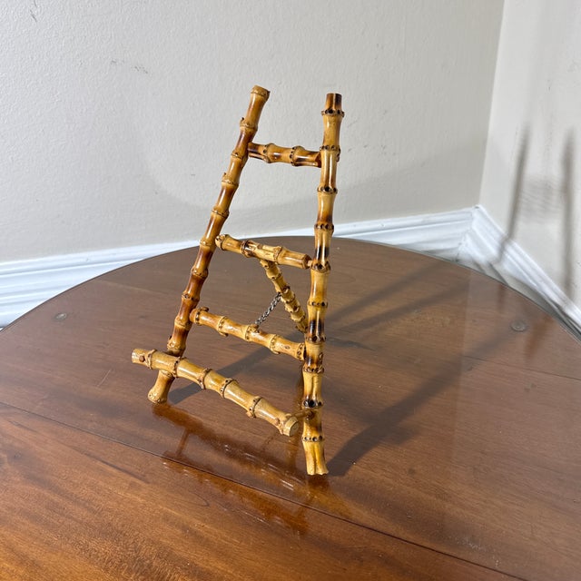 Vintage richly colored burnt tortoise finish bamboo table easel.