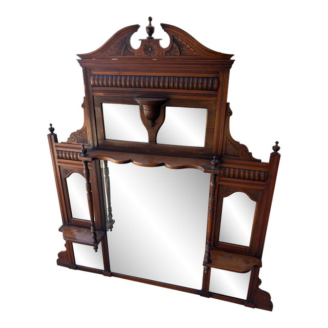 Antique Victorian or Eastlake-Style Carved Wood Overmantel Mirror Featuring Multiple Bevelled Glass Panels and Display Shelves For Sale
