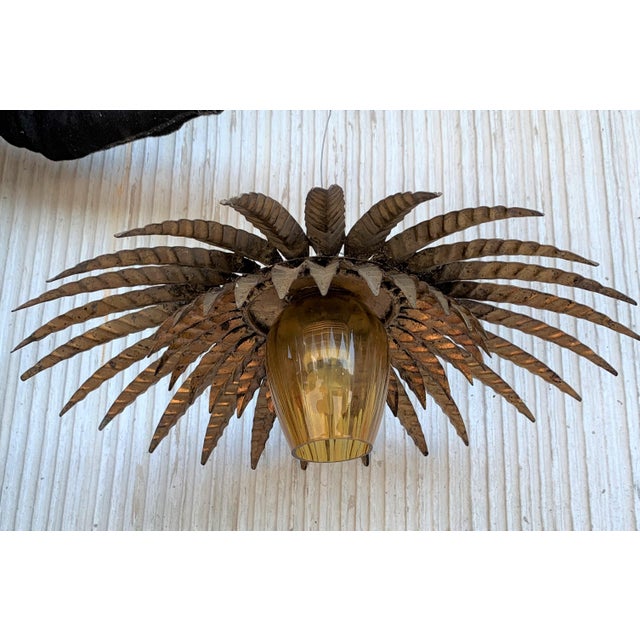 About Mid Century Unusual Sunburst Ceiling Fixture with Glass Tulip Details IN THE STYLE OF Mid-Century Modern PLACE OF...