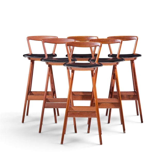Rosengren Hansen for Brande Møbelfabrik Mid Century Teak Barstools - Set of 4 This barstool measures: 14 wide x 16 deep x...