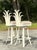 Make a bold statement with this pair of vintage coastal swivel pineapple rattan bar stools, designed to bring a tropical...